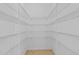 Walk-in closet featuring a custom wire shelving system for optimal storage at 324 Farrow Glen Loop, Cary, NC 27519