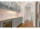Chic butler's pantry with custom cabinetry, wine storage, and a convenient sink at 3347 Alamance Dr, Raleigh, NC 27609