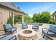 Beautiful patio with outdoor seating, a fire pit, and a pool for backyard enjoyment at 3347 Alamance Dr, Raleigh, NC 27609