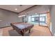 The finished basement boasts a pool table and ample space for recreation and entertainment at 3408 Mount Pisgah Way, Cary, NC 27519