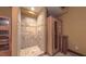 This bathroom offers a custom tile shower and personal sauna at 3408 Mount Pisgah Way, Cary, NC 27519