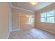Neutral bedroom with an ensuite bathroom, carpet flooring and good natural light at 3408 Mount Pisgah Way, Cary, NC 27519