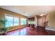 Bright dining room with large windows, hardwood floors, and built in cabinet at 3408 Mount Pisgah Way, Cary, NC 27519