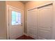 Welcoming entryway featuring a door with glass and a coat closet at 3408 Mount Pisgah Way, Cary, NC 27519