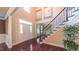 Elegant foyer featuring hardwood floors, a staircase, and natural light streaming through the front door and windows at 3408 Mount Pisgah Way, Cary, NC 27519
