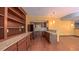 Kitchenette with granite countertops and stainless steel appliances at 3408 Mount Pisgah Way, Cary, NC 27519