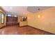 Living area featuring modern pendant lights and built-in cabinets at 3408 Mount Pisgah Way, Cary, NC 27519