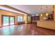 Open living area with hardwood floors, recessed lights, and access to deck at 3408 Mount Pisgah Way, Cary, NC 27519