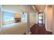 Spacious living room featuring hardwood floors and a cozy fireplace with plenty of natural light at 3408 Mount Pisgah Way, Cary, NC 27519