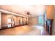 Spacious living room area with decorative pillars and fireplace has carpet and natural light at 3408 Mount Pisgah Way, Cary, NC 27519