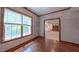 This sun-lit room showcases beautiful hardwood floors and refined trim work at 3408 Mount Pisgah Way, Cary, NC 27519