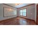 This cozy room boasts hardwood floors, natural light, and beautiful trim work at 3408 Mount Pisgah Way, Cary, NC 27519