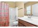 Bathroom featuring a combination shower and tub, along with a sink with vanity at 364 Skymont Dr, Holly Springs, NC 27540