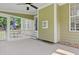 Screened-in porch featuring concrete flooring, ceiling fan, and views of backyard at 37 Meadow Oaks Cir, Smithfield, NC 27577