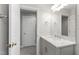 Neat bathroom with a marble countertop sink and silver fixtures offering a clean and functional space at 3908 Sterling Ridge Ln, Durham, NC 27707