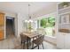 Charming breakfast nook with backyard views, stylish lighting, and convenient access to the kitchen at 3908 Sterling Ridge Ln, Durham, NC 27707