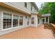 Expansive wooden deck offers ample space for outdoor dining and entertainment with views of the backyard at 3908 Sterling Ridge Ln, Durham, NC 27707