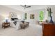 Serene bedroom with plush carpet, stylish decor, and natural light at 3912 Kildrummy Dr, Durham, NC 27705