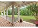 Spacious front porch offering an open view of the landscaped front yard at 3912 Kildrummy Dr, Durham, NC 27705