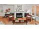 Cozy living room with fireplace and stylish decor at 3912 Kildrummy Dr, Durham, NC 27705