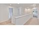 Bright hallway with natural light, carpet and doors leading to different rooms at 407 Elm Farm Pl, Morrisville, NC 27560