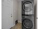 Modern laundry area with stacked LG washer and dryer units at 408 Flagg Rd, Holly Springs, NC 27540