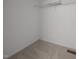 Carpeted walk-in closet with wire shelving providing ample storage space at 408 Flagg Rd, Holly Springs, NC 27540