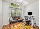 Bright office with a futon, desk and large windows providing natural light and views at 408 Heritage Village Ln, Apex, NC 27502