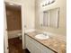 This bathroom has granite countertops, tile floors, and tile shower at 411 Gooseneck Dr # A1, Cary, NC 27513