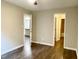 This bedroom features a ceiling fan and wood floors at 411 Gooseneck Dr # A1, Cary, NC 27513