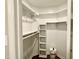 Walk-in closet features built-in shelving and ample storage space at 411 Gooseneck Dr # A1, Cary, NC 27513
