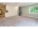 Expansive bedroom includes built-in storage cabinets and a ceiling fan for comfort at 4204 Thetford Rd, Durham, NC 27707