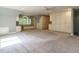 Large bedroom with built-in window seating and abundant storage cabinets at 4204 Thetford Rd, Durham, NC 27707