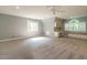 Bright bedroom with a cozy window nook and built-in desk and shelves at 4204 Thetford Rd, Durham, NC 27707