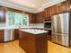 Well-equipped kitchen featuring stainless steel appliances and ample cabinet space at 4204 Thetford Rd, Durham, NC 27707