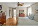 Comfortable bedroom boasting hardwood floors and ample natural light at 4702 Pleasant Green Rd, Durham, NC 27705