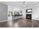 Open-concept living space flows from the kitchen and is anchored by a fireplace at 50 Rainwood Ct, Louisburg, NC 27549