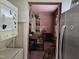 View of the dining room featuring a chandelier and doorway to the living area at 500 W Main St, Benson, NC 27504