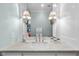 Charming bathroom vanity featuring marble countertops and stylish sconce lighting fixtures at 504 Yarmouth Rd, Raleigh, NC 27608