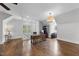Spacious bonus room with wood floors, natural light, desk and storage at 504 Yarmouth Rd, Raleigh, NC 27608