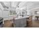 Gourmet kitchen featuring a large center island, custom cabinets, and high-end appliances at 504 Yarmouth Rd, Raleigh, NC 27608