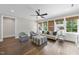 Spacious living room with built-in shelves and hardwood floors creates a comfortable and stylish space at 504 Yarmouth Rd, Raleigh, NC 27608