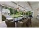 Covered outdoor dining area with a large table and chairs, perfect for entertaining at 504 Yarmouth Rd, Raleigh, NC 27608
