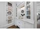 Custom pantry with open shelves and glass cabinets, offering ample storage and display space at 504 Yarmouth Rd, Raleigh, NC 27608