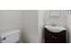 A half-bathroom shows a white toilet and a granite countertop vanity at 5108 Briton Pl, Fuquay Varina, NC 27526