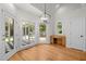 Bright breakfast nook features hardwood floors, vaulted ceilings, and natural light at 5108 Briton Pl, Fuquay Varina, NC 27526