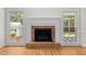 Fireplace with white mantle and windows on either side at 5108 Briton Pl, Fuquay Varina, NC 27526