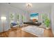 Bright home office with hardwood floors, white trim, and ample natural light at 5108 Briton Pl, Fuquay Varina, NC 27526