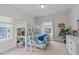 bedroom featuring a stylish bunk bed, window views, and ample natural light creating a cozy and playful atmosphere at 512 Teal Lake Dr, Holly Springs, NC 27540