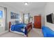 Bedroom featuring a comfortable bed, decor, and natural light creating a cozy and inviting atmosphere at 512 Teal Lake Dr, Holly Springs, NC 27540